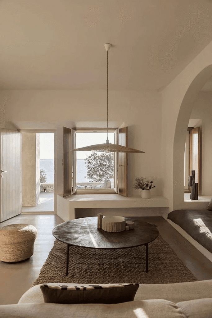 Sun-drenched Mediterranean interior design style featuring terracotta flooring, and rustic whitewashed walls