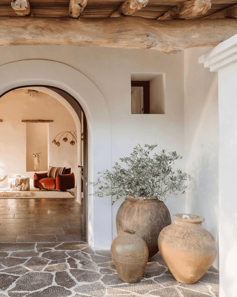 Traditional Spanish interior design styles with dark wood accents, and patterned accent tiles