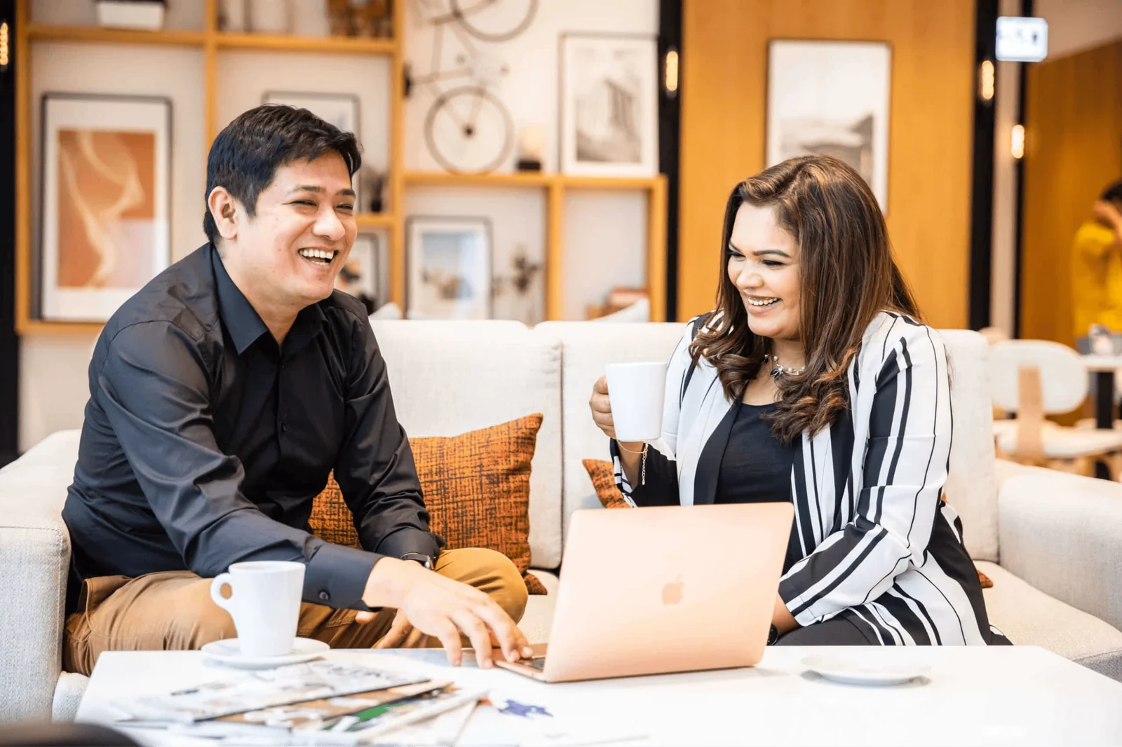dina murali and zain belgami interior designers in dubai working on a project together